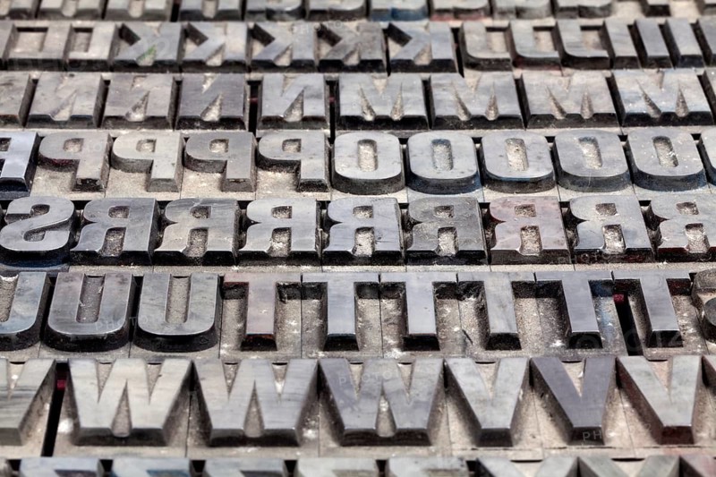 Hot metal printing setting, old letters made of lead for letterpress printing, Lettern aus dem Buchdruck, Bleisatz
