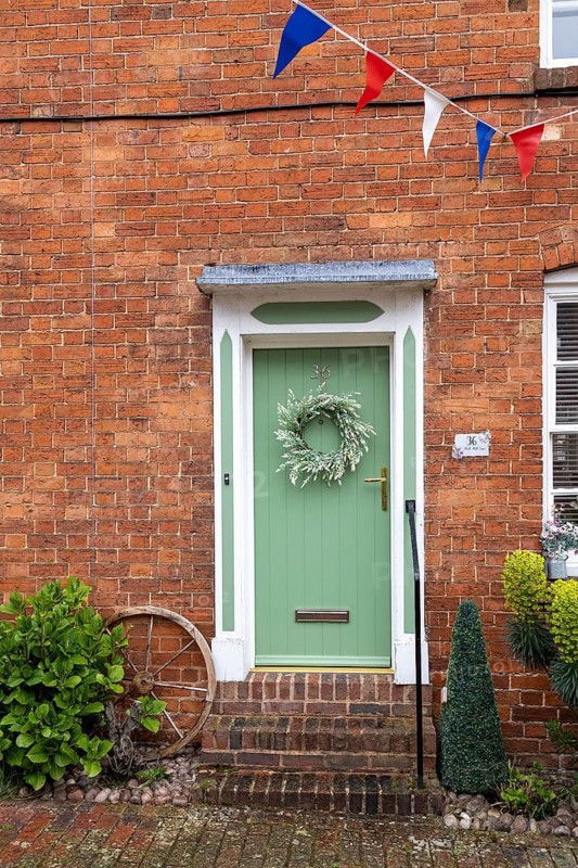 Green front door, Alcester, England, Great Britain