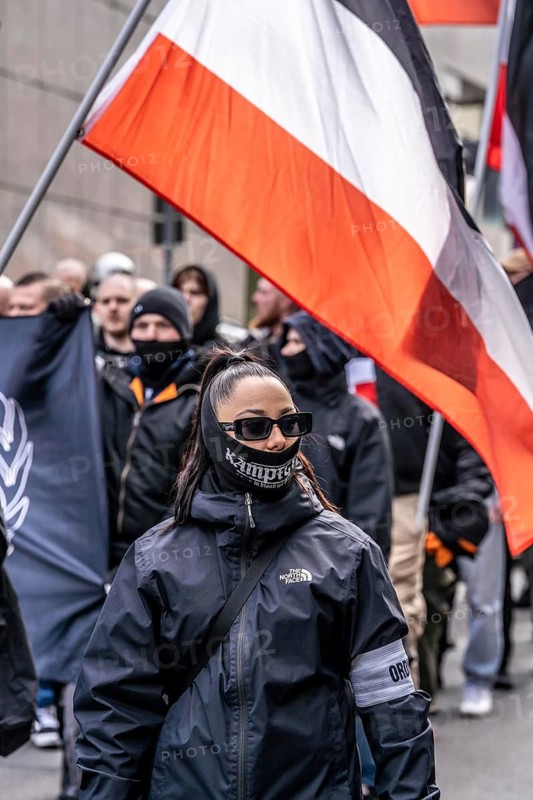 The neo-Nazi group Jung und Stark, JS, demonstrates in the city centre of Essen, demanding the remigration of foreigners, chanting Deutschland den Deutschen Ausländer raus, approx. 150 ultra right-wingers, dressed in black and wearing typical scene clothing, several groups demonstrate against the Nazi march, Essen, North Rhine-Westphalia, Germany