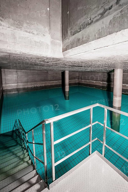 Large room with water, blue tiles and metal railings, Waterworks ENCW Netze Calw, Calw, Black Forest, Germany