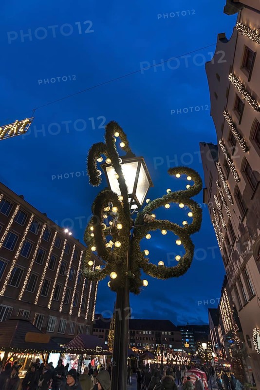 Decorated street lamp at the Christkindlesmarkt, Nuremberg, Middle Franconia, Bavaria, Germany