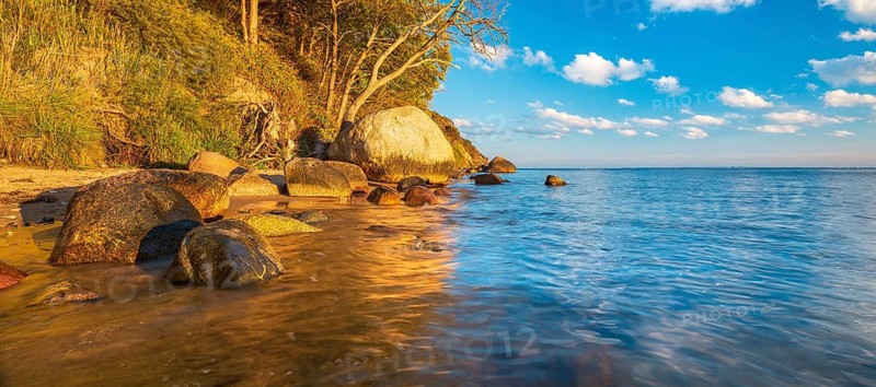 Coastal landscape with large boulders on the Baltic Sea beach in the evening light, Mönchgut Nature Reserve, Groß Zicker, Mönchgut Peninsula, Rügen Island, Mecklenburg-Western Pomerania, Germany