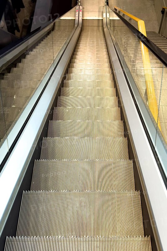 Escalator photographed from top to bottom, international