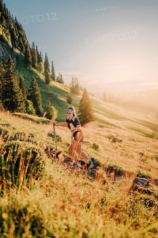 Summer trail running and hiking in the Alps on the Riedberg Pass between Obermaiselstein and Balderschwang in the Allgäu, Bavaria, Germany