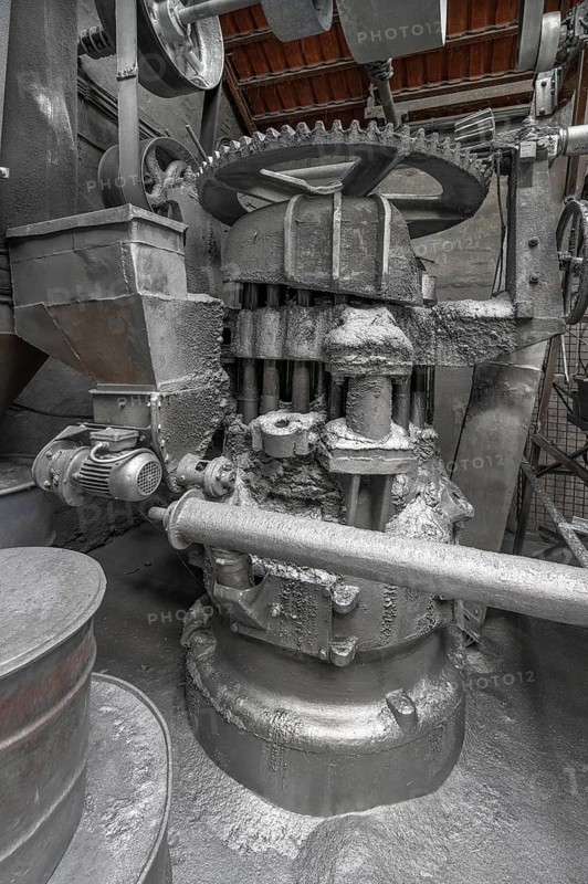 Stamping machine with transmission drive for the production of zinc powder of a metal powder mill, founded in 1900, Igensdorf, Upper Franconia, Bavaria, Germany