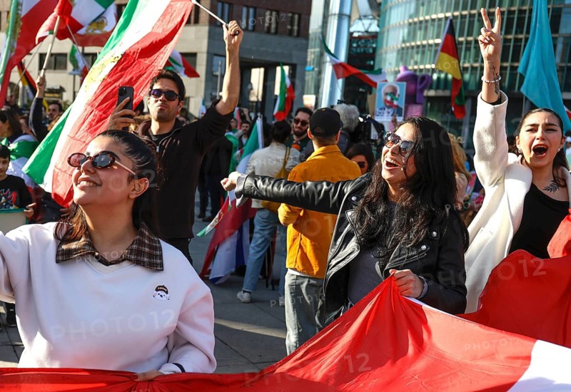 Iranians demonstrate on the day of the US and Israeli attack on Iran in Berlin, 28.02.2026. People cheer the rumor that Obermullah Khamenei died in the attack, Berlin, Berlin, Germany