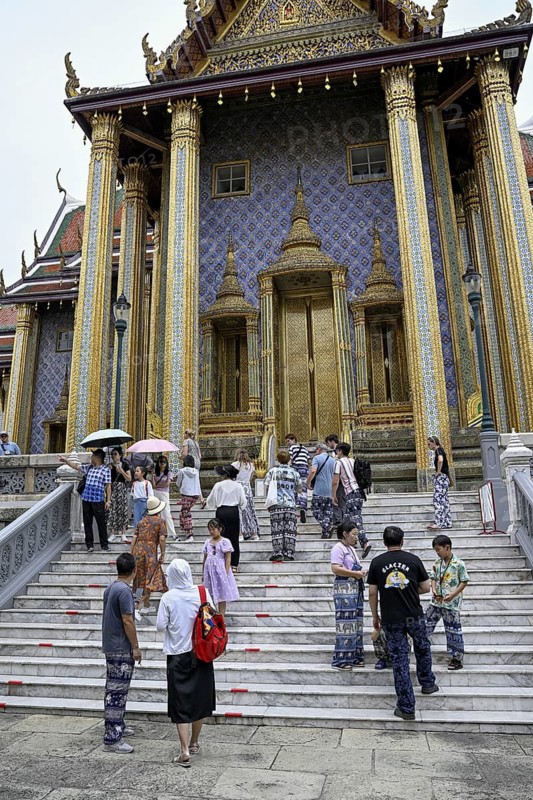 Tourists at Wat Phra Kaew, Temple of the Emerald Buddha, Bangkok, Thailand