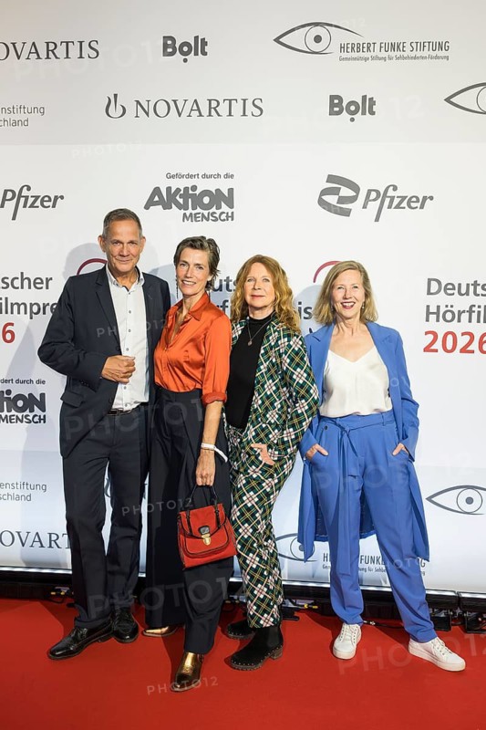 Klaus-Peter Grap, Julia Bremermann, Marion Kracht and Petra Zieser in front of the German Audio Film Awards ceremony at the Colosseum cinema in Berlin on 24.03.2026