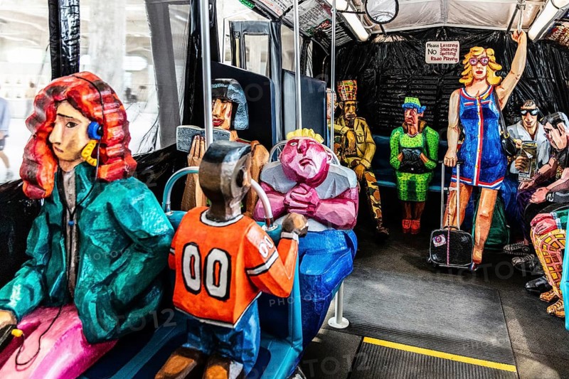 Sculpture The Bus by artist Red Grooms, depicting hectic city life with various passengers, FENIX, museum about migration, in a historic warehouse in Katendrecht, hub for overseas emigrants, Rotterdam, Netherlands