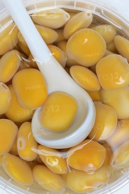 Lupine (Lupinus), pickled lupine seed in small bowls