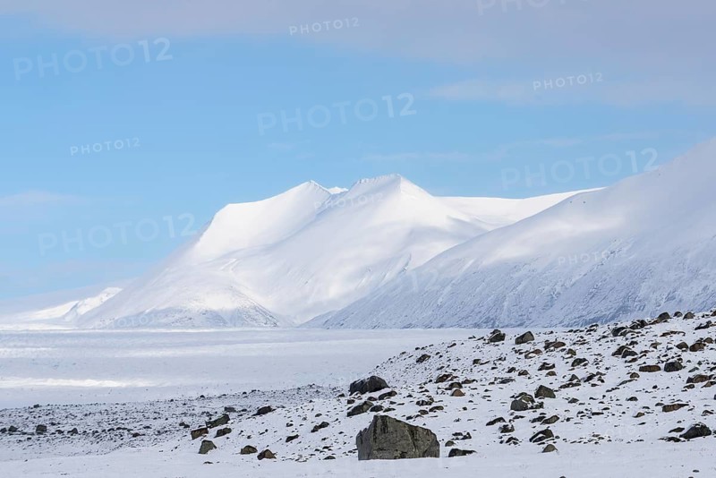 Lava rock field, mountain range, snow, winter, Vatnajökull region, Iceland, Scandinavia