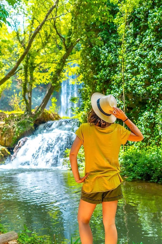 A female tourist visiting the Monasterio de Piedra Natural Park, Aragon, Spain