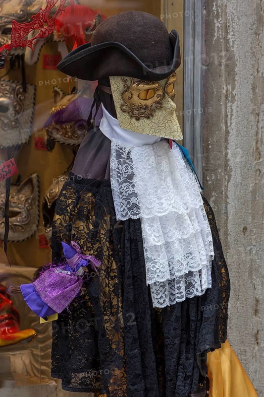Venetian carnival costume in front of a shop, Venice, Veneto, Italy