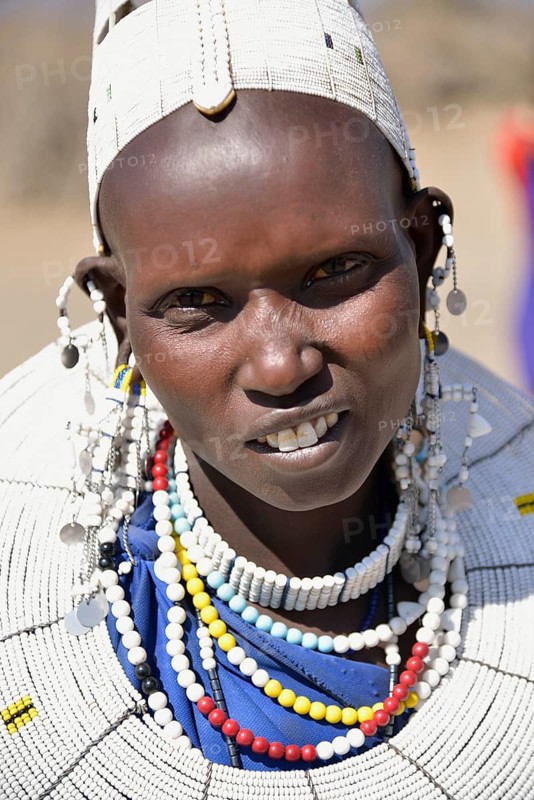 Maasai woman wearing traditional jewellery, Ngorongoro Conservation Area, Ndema, Tanzania