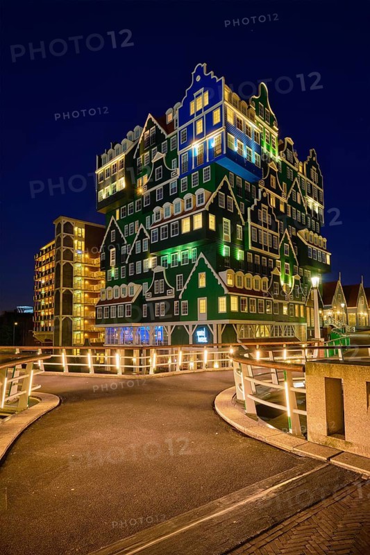 ZAANDAM, NETHERLANDS, MAY 8, 2017: Inntel Hotel in Zaandam illuminated at night. Design of 12-storey tall building opened in 2009 is the result of stacking a series of traditional Dutch houses