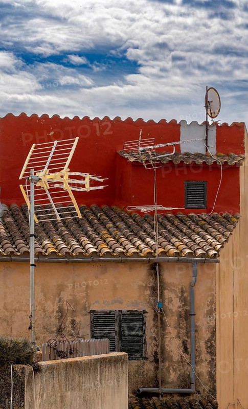 View of Mediterranean houses, roofs and courtyards from the town wall, Alcudia, Majorca, Spain