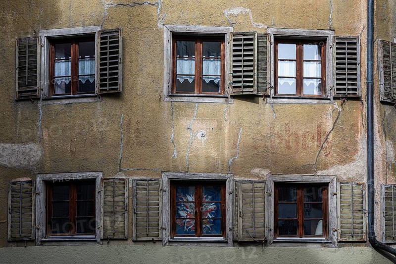 An old, dilapidated, dilapidated residential building, apartment building with shutters in the historic old town of Constance, district of Constance, Baden-Württemberg, Germany