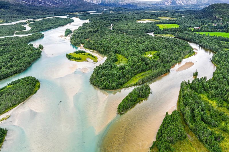 Aerial view of the Glamaga river delta, (Glomådeltaet or Glomåga-deltaet), turquioise water, near Mo i Rana, Norway