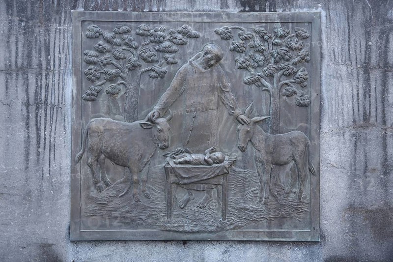 Relief depicting the biblical scene of the birth of Jesus with Joseph at the Saint Francis monument, modern art, St. Johannes Nepomuk, Hadamar, Melanderplatz, Westerwald, Hesse, Germany