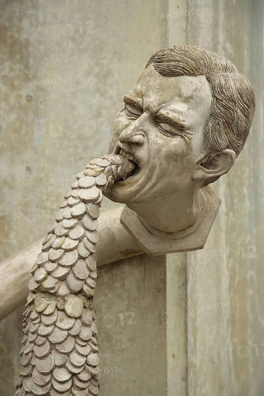 Sculpture Paradise Serpent by Peter Lenk 2015, LIDL manager, money, coins, money coins, wealth, greed, power, symbol, swallow, eat, mouth, face, detail, eat, spit, Lidl, manager, Singen, Hohentwiel, Hegau, Baden-Württemberg, Germany