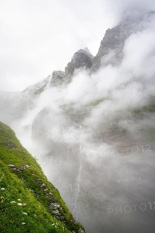 Cloud-covered mystical rock gorge with waterfalls, hike to Berghaus Bäregg, Bernese Alps, Bernese Oberland, Switzerland