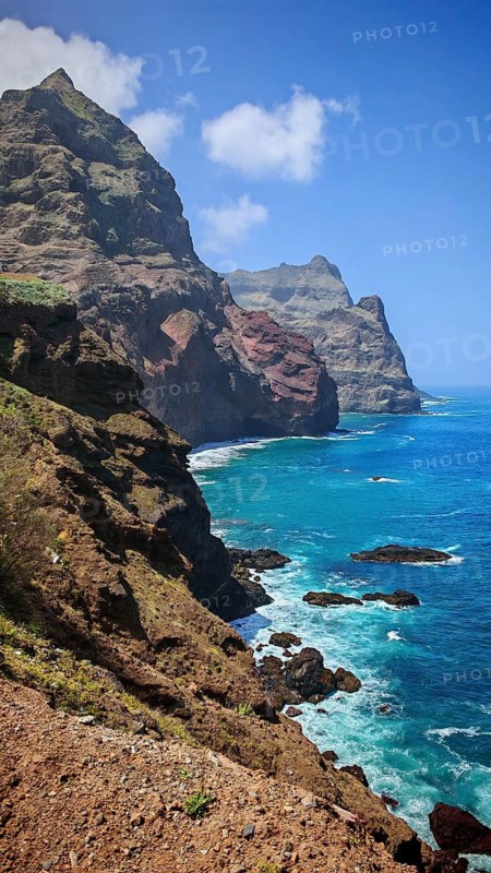 Dramatic rocky coast on the blue sea under clear sky, Sao Vicente, Cabo Verde, Cape Verde, Cape Verde