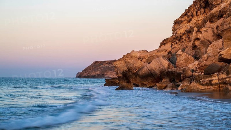 Sunrise on the coast near Mirbat, Oman