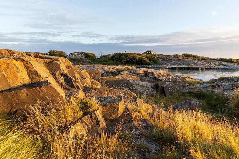 The warm evening light falls on the rocks of the archipelago, North Sea, west coast near Lerkil, Hallands län, Sweden