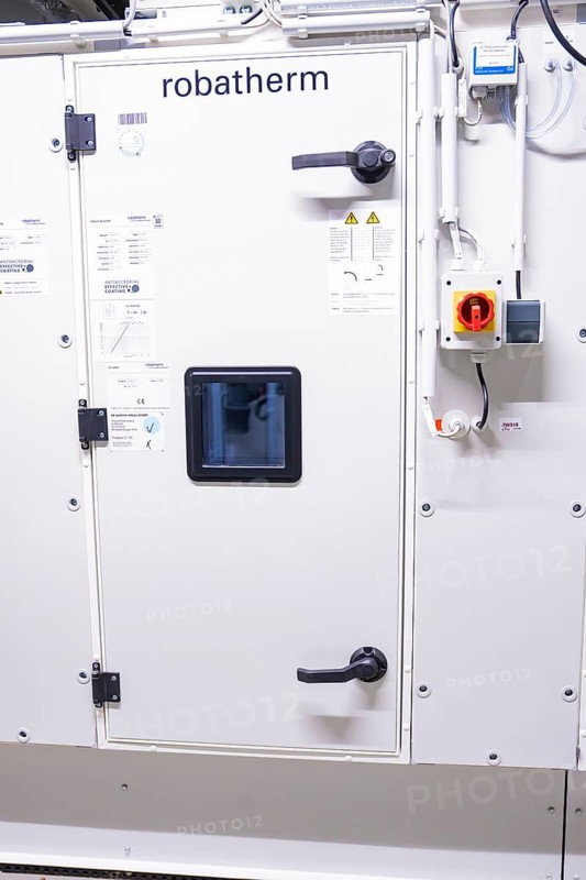 Detailed view of a white control cabinet door in an industrial environment, ventilation system, technical room, Calw, Germany