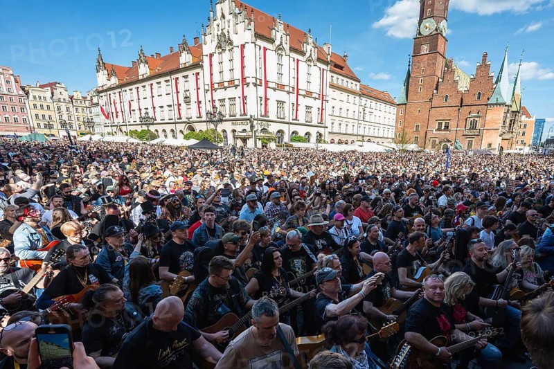 WROCLAW, POLAND - MAY 1, 2025: World Guitar Record concert, 8122 participants played Jimi Hendrix's song Hey Joe on guitars in the Wroclaw market square