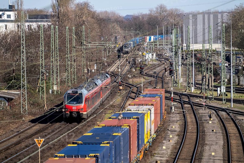 Local trains on the line, container trains in the freight yard, so-called installation tracks in Duisburg-Rheinhausen, freight trains are parked here at short notice in front of continuing their journey, either to the trimodal terminal in Logport Duisburg or from there to distant destinations, such as China, as part of the new Silk Road, North Rhine-Westphalia, Germany