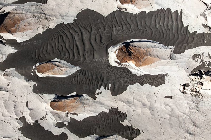 Aerial view of the striking pumice field formations in Catamarca, Argentina, showcasing unique patterns and textures shaped by natural forces over time