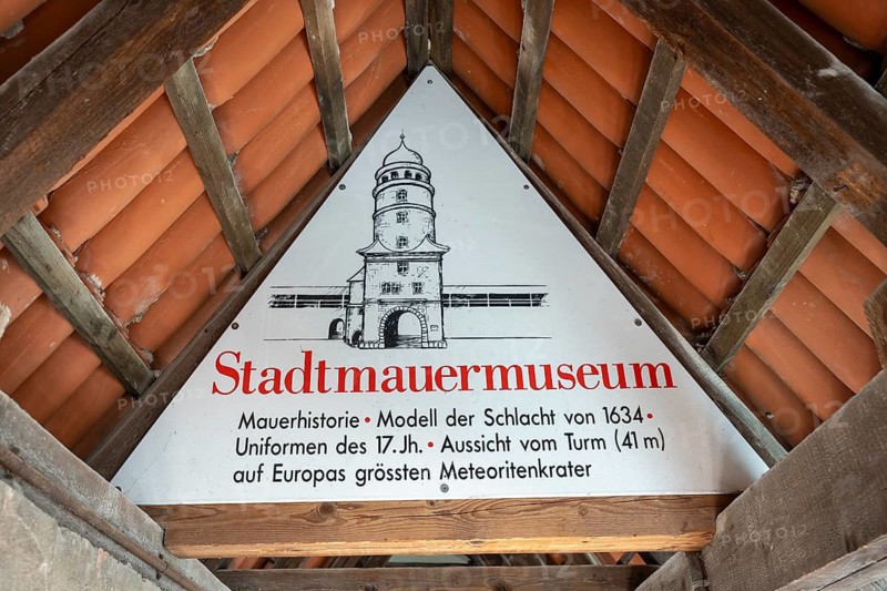 Information sign in the historic rampart for the city wall museum in the Löpsinger Turm, Donau-Ries district, Nördlinger Ries, Bavaria, Germany