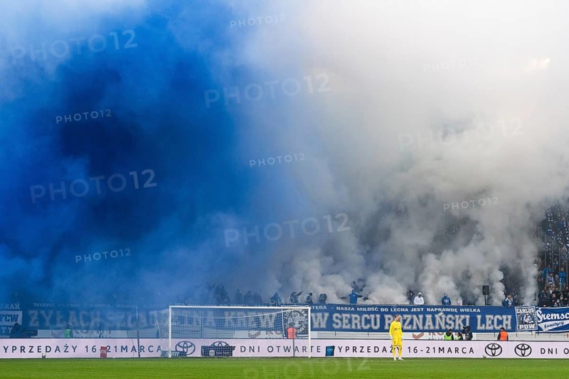 LUBIN, POLAND - MARCH 15, 2026: Football match between KGHM Zaglebie Lubin vs Lech Poznan. Supporters of Lech and smoke from pirotechnic