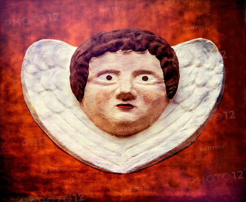 Old angel figure, late Renaissance stone carving, Rinnesches Haus, Kornmarkt, Osterode am Harz, Germany