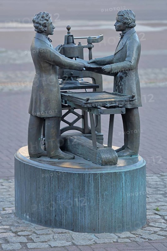 Fountain of Freedom by Bonifatius Stirnberg 1992, organiser of the Hambach Festival by Philipp Jakob Siebenpfeiffer and Johann Georg August Wirth at a historical printing press, monument to the Vormärz of the German political democracy movement for freedom, democracy, freedom fighters of German history, human rights, freethinkers, modern art, national flag, bronze sculptures, figures, politics, symbol, Homburg, Saarland, Germany