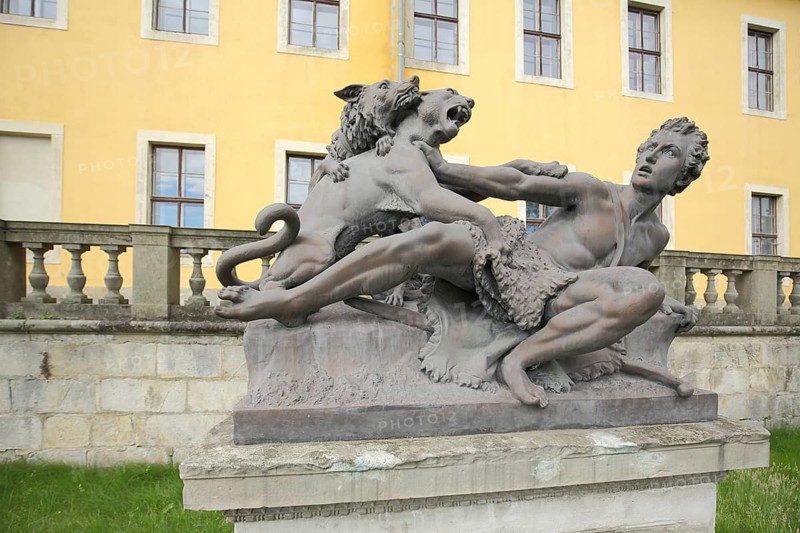 Man fighting sculpture with lion figure and wolf figure, castle garden, baroque castle, Ballenstedt, Harz, Saxony-Anhalt, Germany