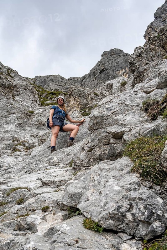 Mountaineer on the steep ascent to Waxenstein, Wetterstein Mountains, Garmisch-Patenkirchen, Bavaria, Germany