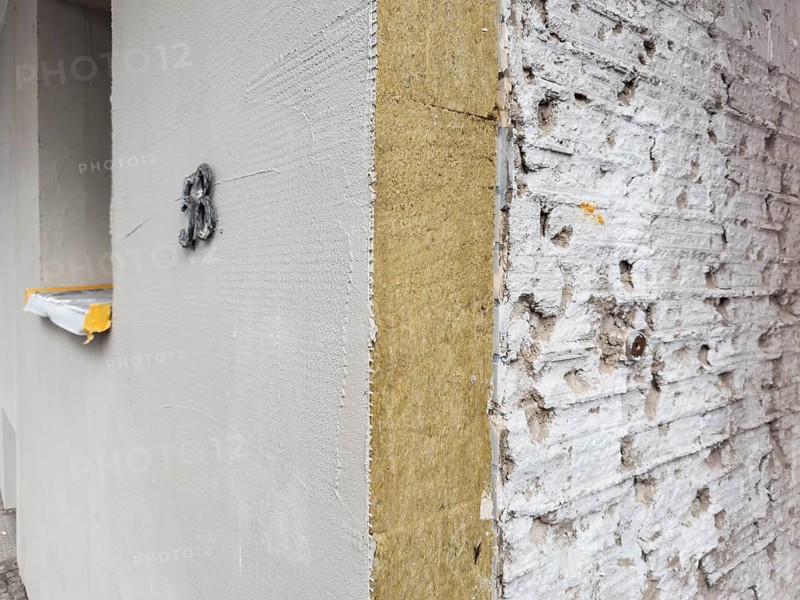 The façade of an apartment building is being energetically renovated with mineral wool insulation boards, Düsseldorf, Germany