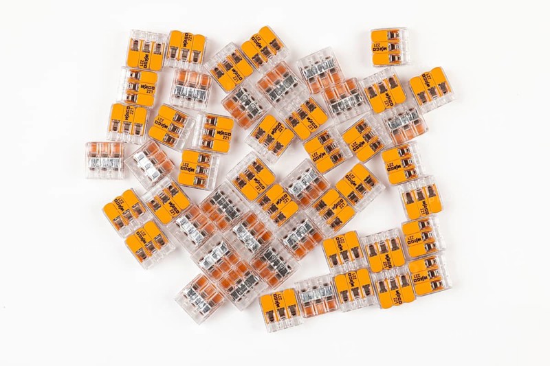 Numerous connection terminals for electrical installations on a white background