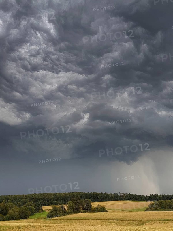 A thunderstorm cell with heavy rain and hail passes over the Butzbach region in Wetterau, Wetterau, Butzbach, Hesse, Germany