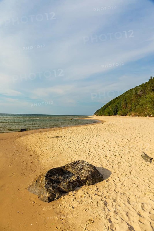 Beach at sunset, close to Miedzyzdroje (Misdroy), a village in Kamien Pomorski County, West Pomeranian Voivodeship, in northern Poland and the Wolin National Park