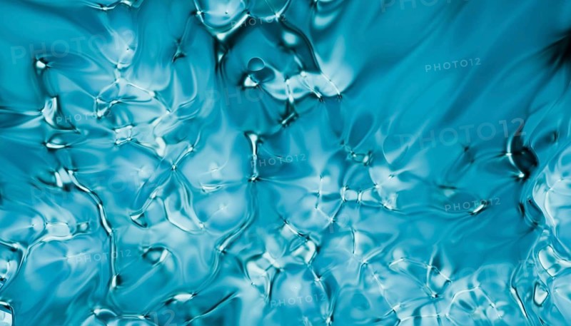 This image features an abstract, fluid art texture in shades of blue, rendered in 3D for a visually captivating effect