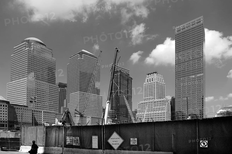 Construction fence with skyscrapers at Ground Zero, black and white, New York City, USA