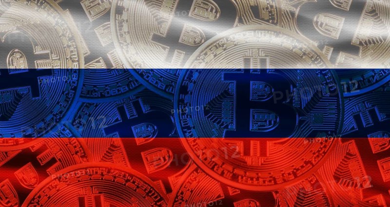 Various Bitcoins on Russia flag background. Golden bitcoin coins on Russia flag background