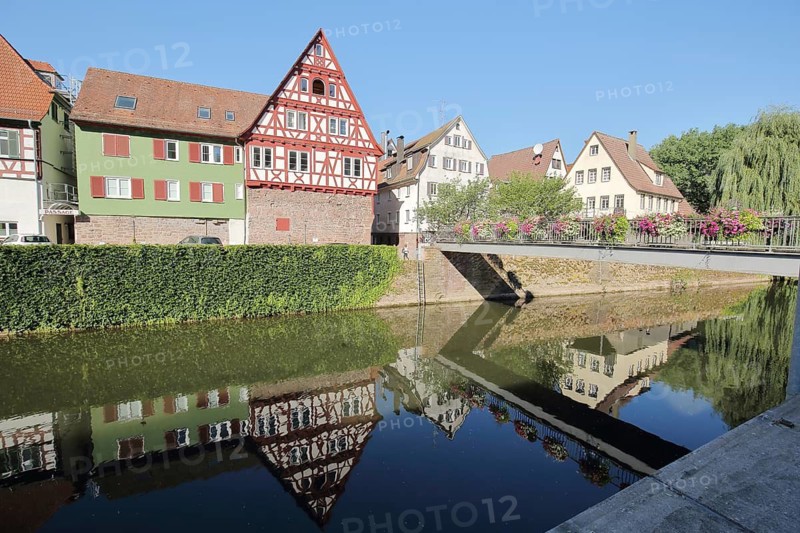 Reflection of half-timbered houses in the Nagold River, Idyll, Weinsteg, Calw, Nagold Valley, Northern Black Forest, Black Forest, Baden-Württemberg, Germany