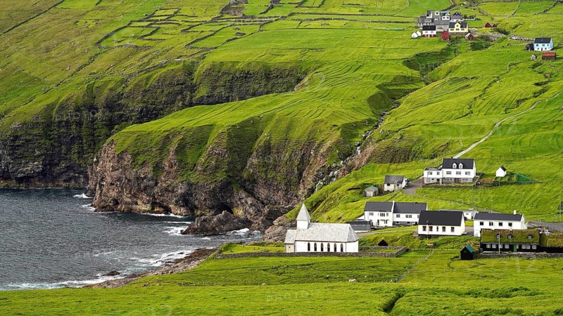 Europe, Denmark, Faroe Islands, Vidareidi, town view with church, Faroe Islands, Denmark