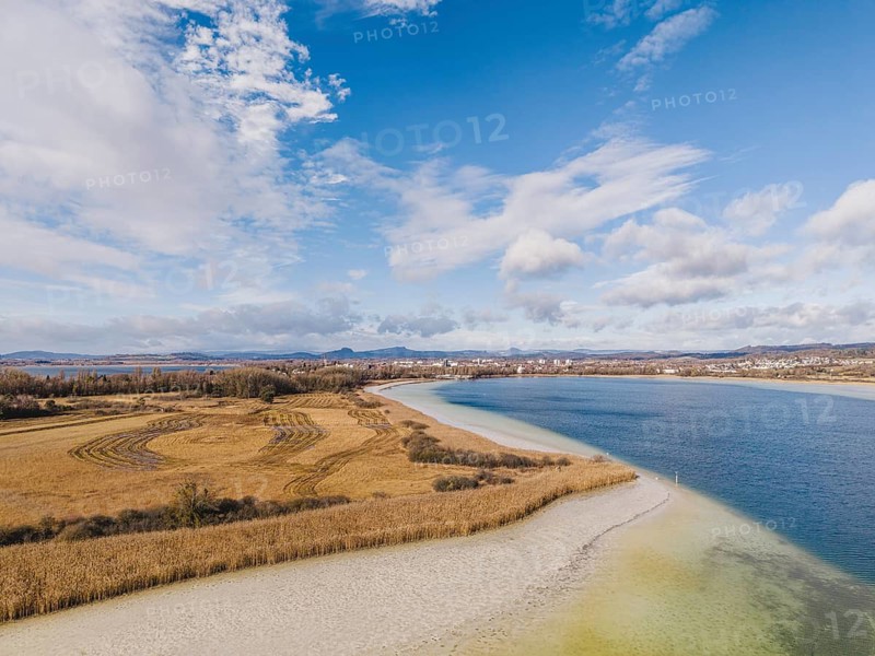 Aerial view of the Mettnau peninsula near Radolfzell on Lake Constance at low tide, the Hegauberge Mountains on the horizon, Konstanz district, Baden-Württemberg, Germany