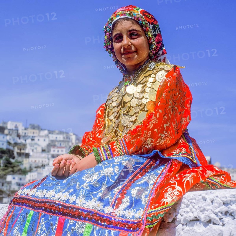 Kanakaries (girl) with gold jewellery, on Easter Tuesday (Lambri Tritti), Olymbos, Karpathos, Dodecanese, Greece