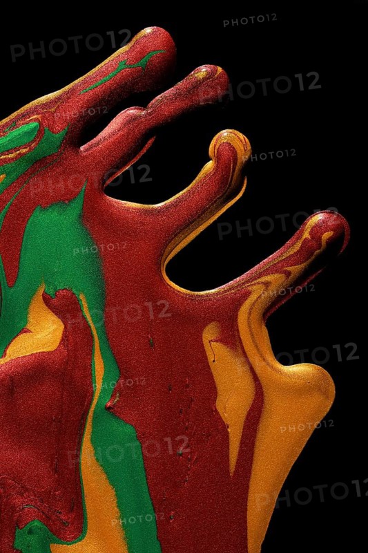 Vibrant metallic paints in red, green, and gold hues dramatically drip and blend on a dark background, creating a textured abstract effect
